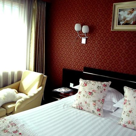 Overseas Chinese International Hotel Qingdao Exterior foto