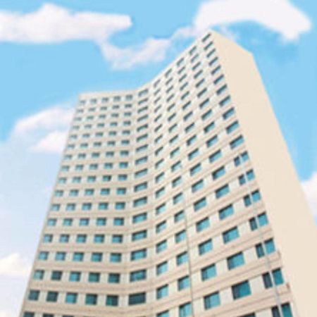 Overseas Chinese International Hotel Qingdao Exterior foto