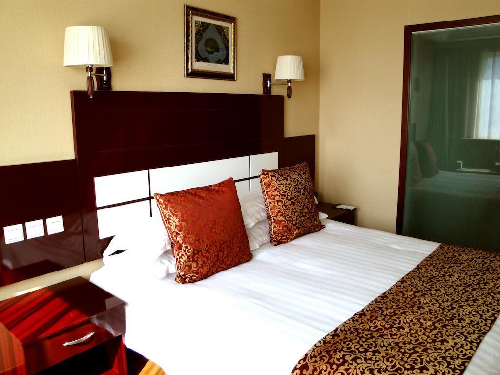 Overseas Chinese International Hotel Qingdao Exterior foto