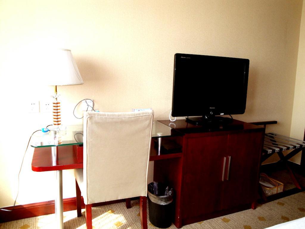 Overseas Chinese International Hotel Qingdao Exterior foto