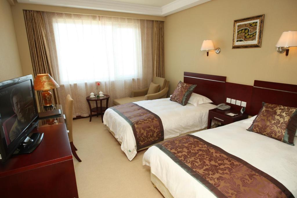 Overseas Chinese International Hotel Qingdao Exterior foto