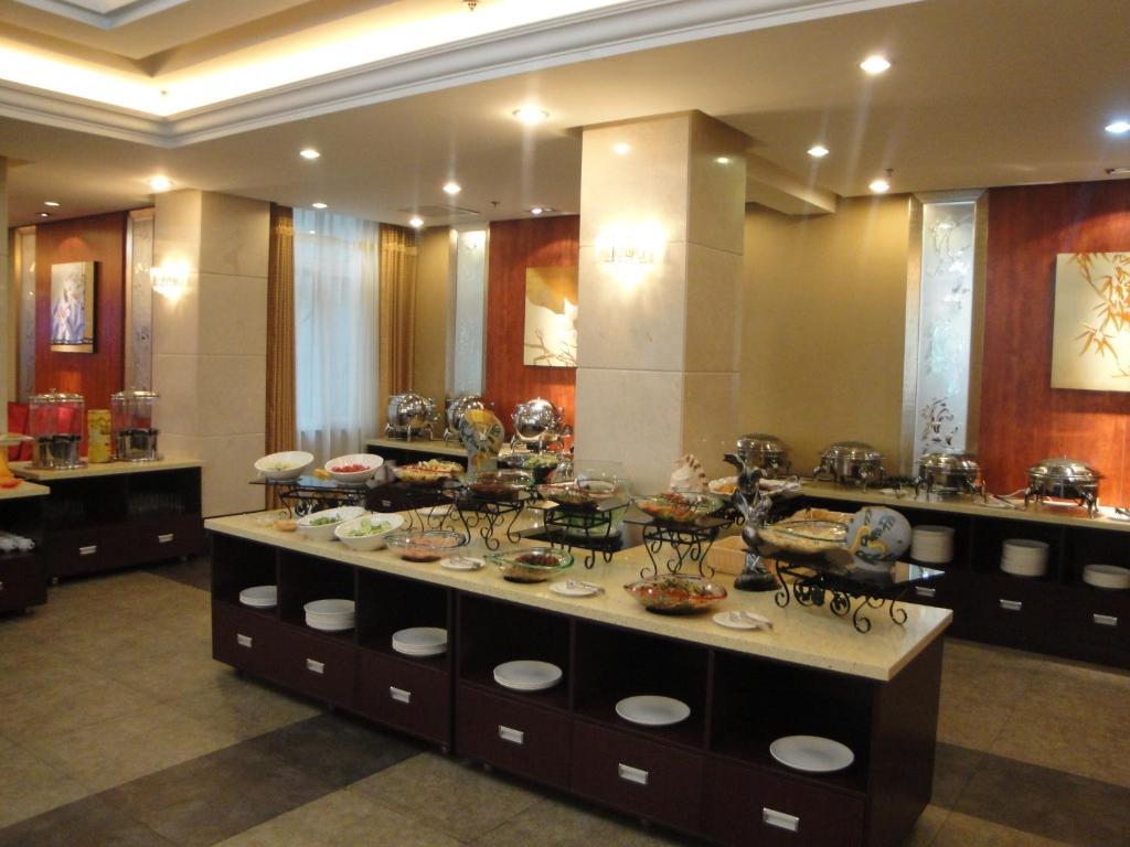 Overseas Chinese International Hotel Qingdao Exterior foto