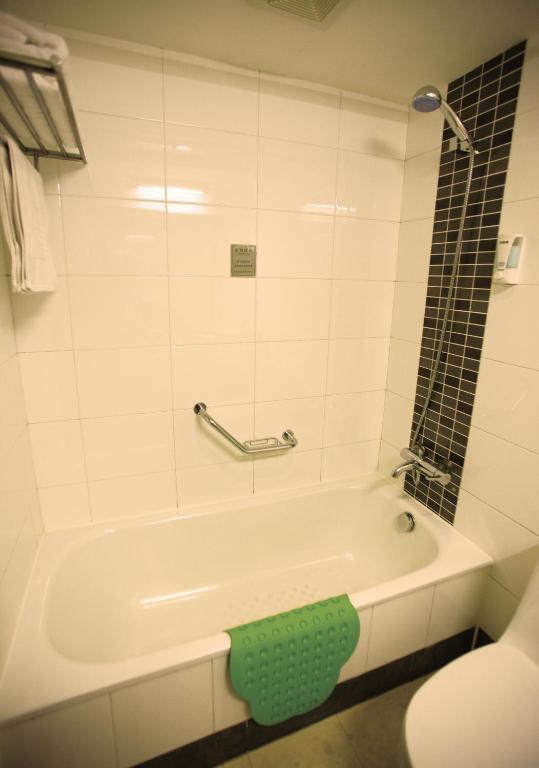Overseas Chinese International Hotel Qingdao Quarto foto