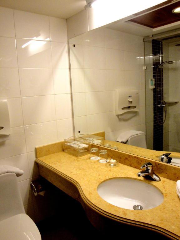 Overseas Chinese International Hotel Qingdao Quarto foto