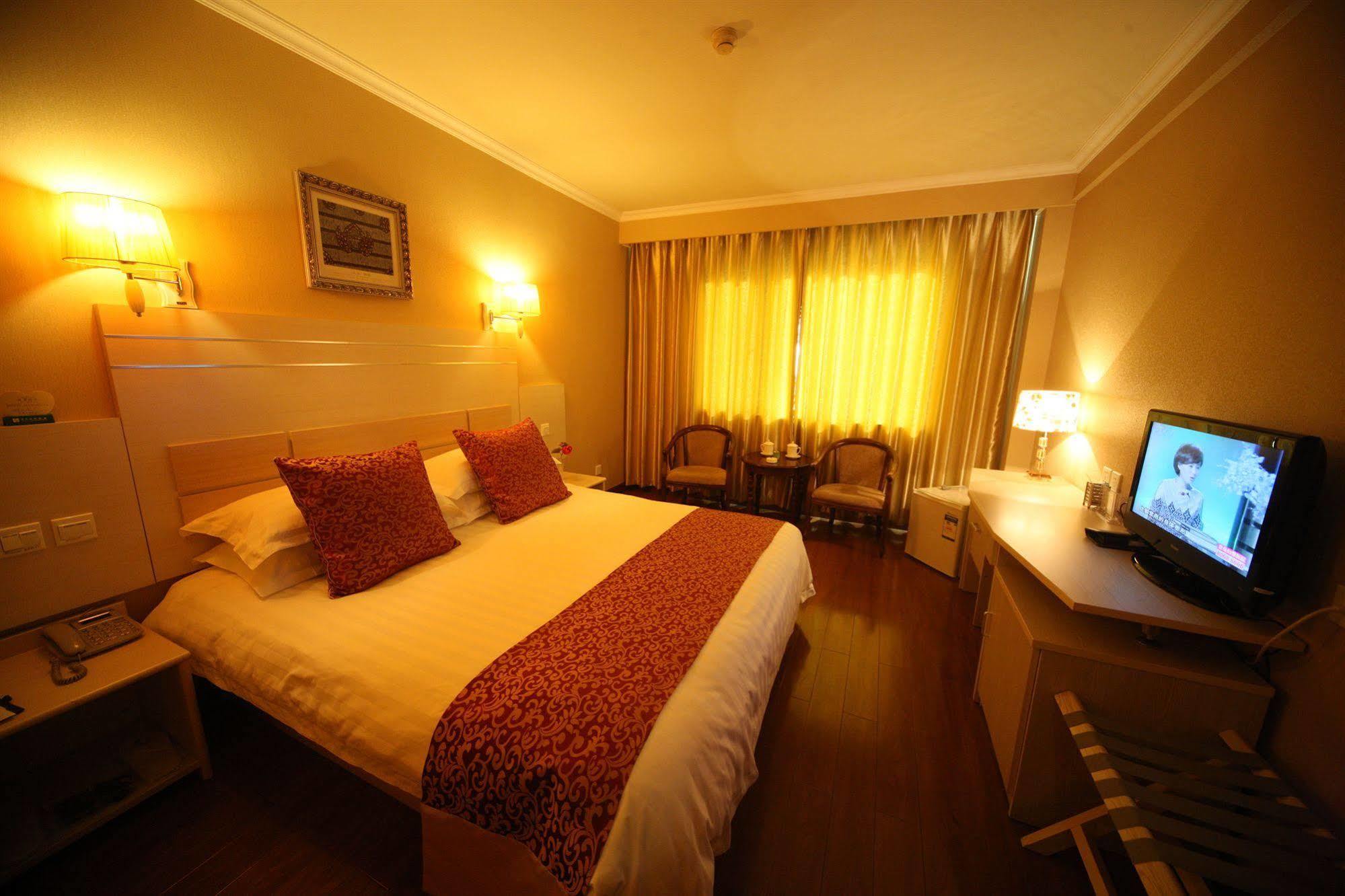 Overseas Chinese International Hotel Qingdao Exterior foto