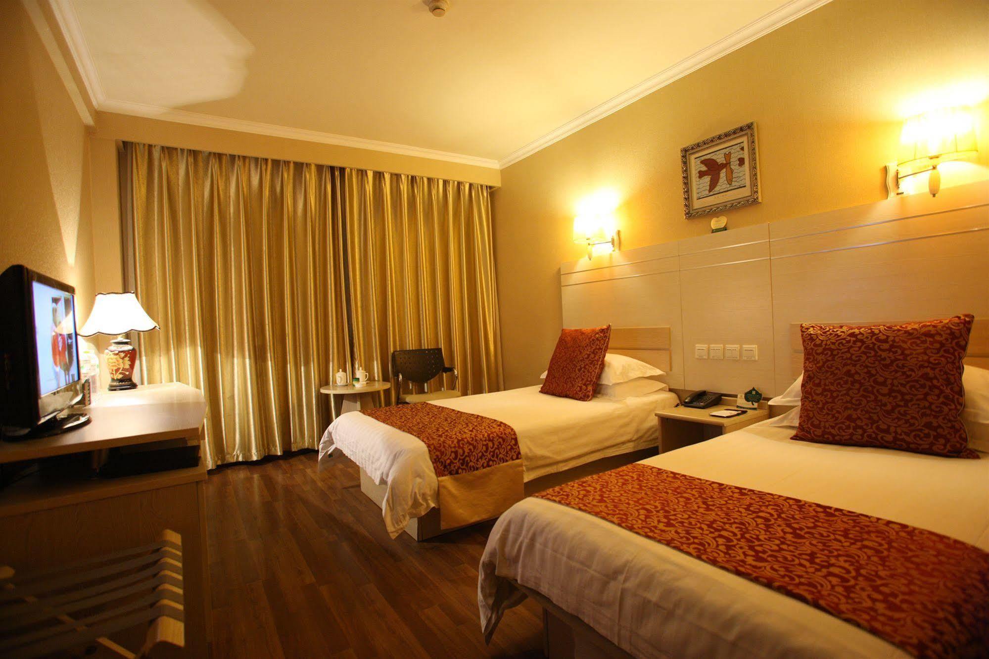 Overseas Chinese International Hotel Qingdao Exterior foto